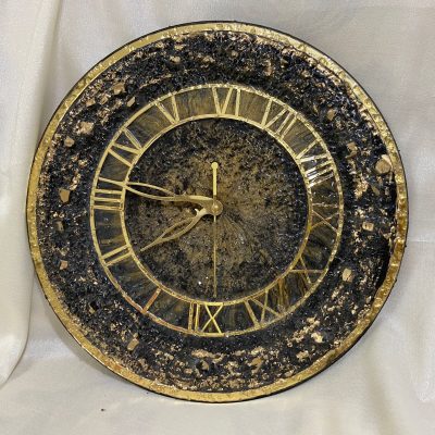 Black golden wall clock embellished with crystal glass